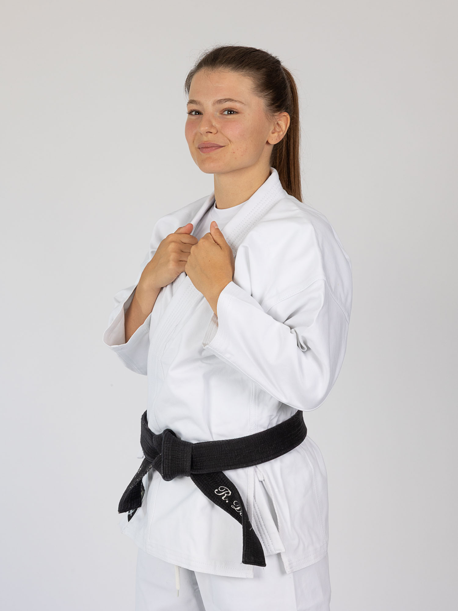 Judo-Gi, weißer Gi, Kampfkunst, schwarzer Gürtel, Uniform