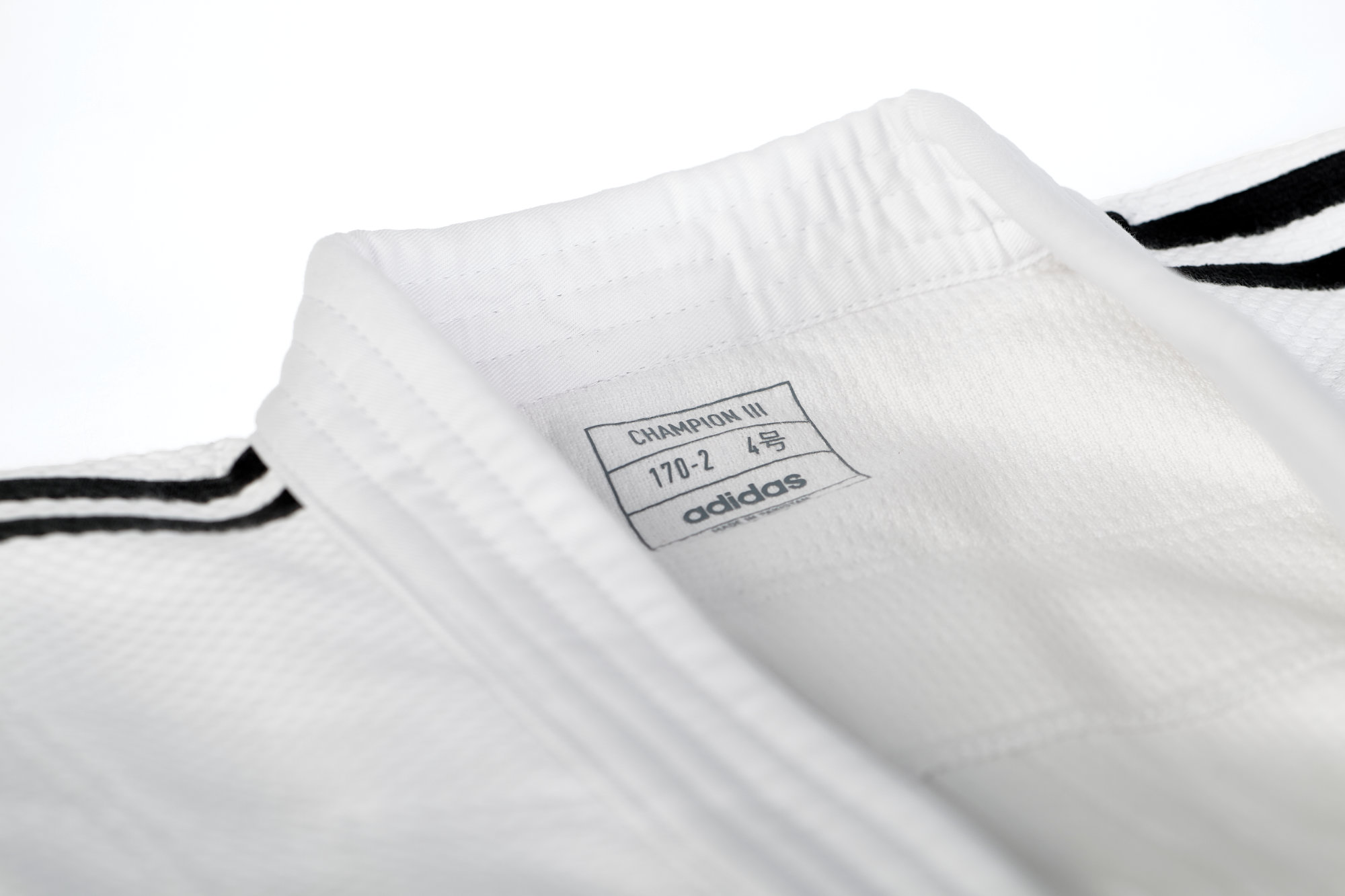adidas Judoanzug CHAMPION III IJF - Model 1 weiß/schwarze Streifen JIJFS adidas Judoanzug CHAMPION III IJF - Model 1 weiß/schwarze Streifen JIJFS