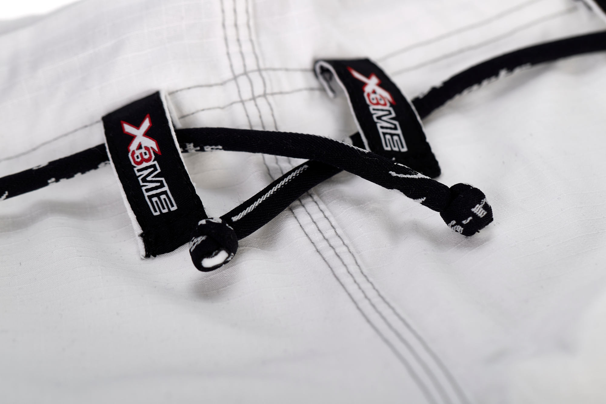 9237000-Extreme-white-weiss-D0866 BJJ-Anzug EXTREME White 2.0 TV Burghausen