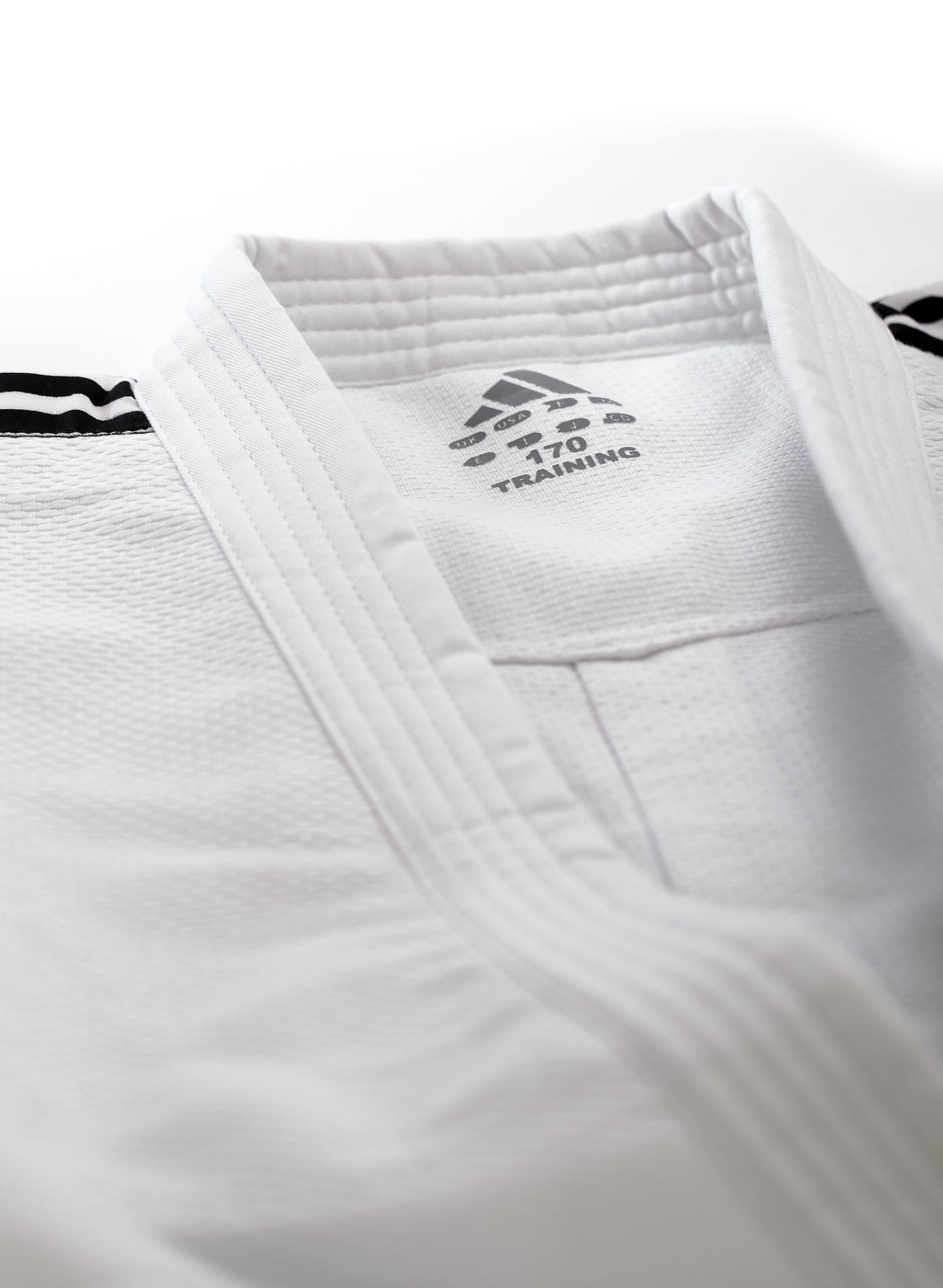 adidas Judo-Anzug Training weiß/schwarze Streifen, J500 adidas Judo-Anzug Training weiß/schwarze Streifen, J500